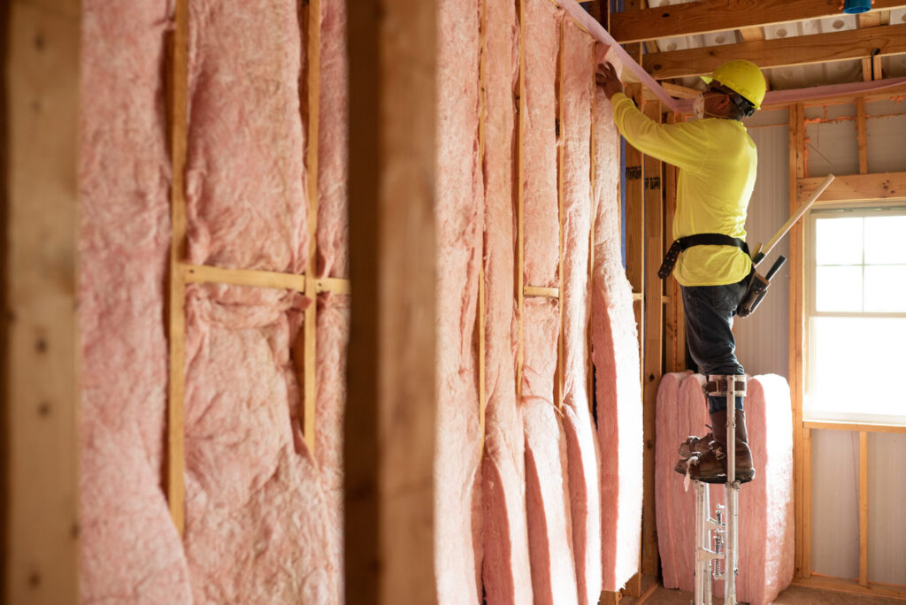 Batt insulation installed evenly between attic joists.