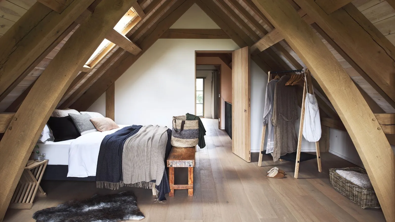 Hot attic space with sunlight heating the roof and trapped air buildup.